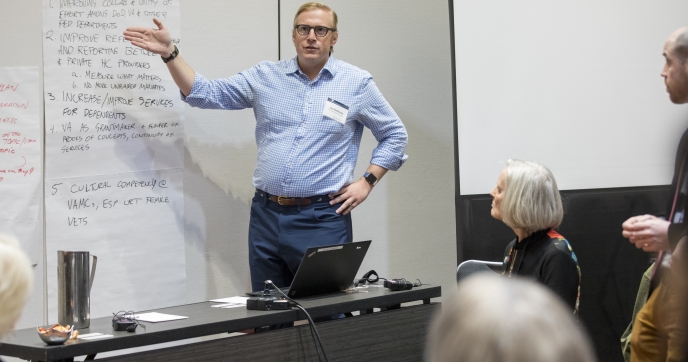 Man presenting at a meeting