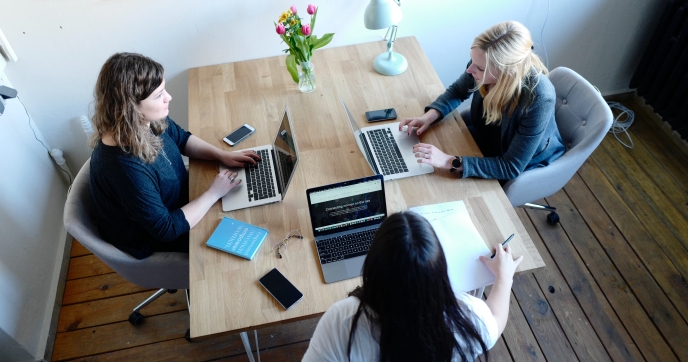 Professionals talking in a group