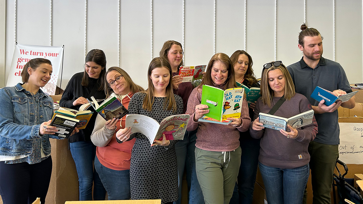 ICF staff regularly volunteer at various nonprofits, including the United Way Book Drive, to offer hands-on support.