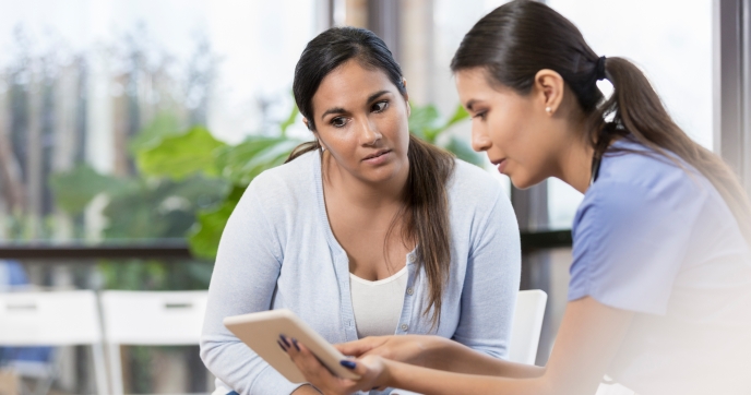 Two professionals in a discussion